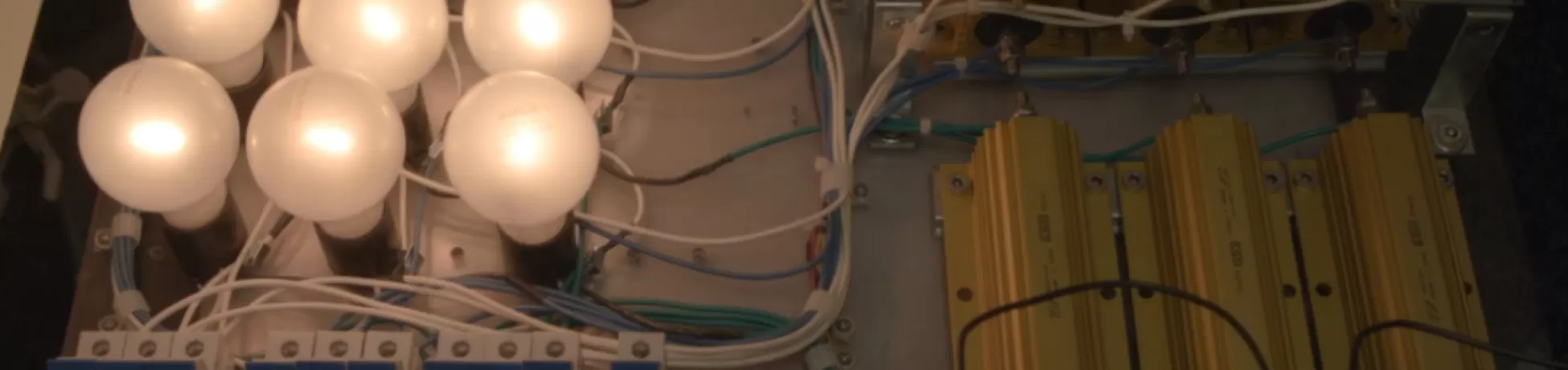 image of lightbulbs connected to wires and grids