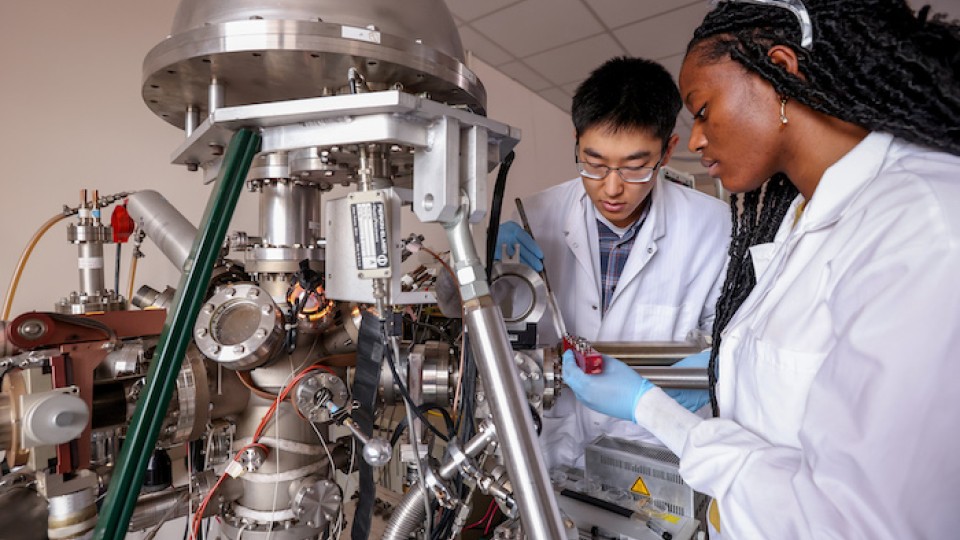 Researchers working in the lab